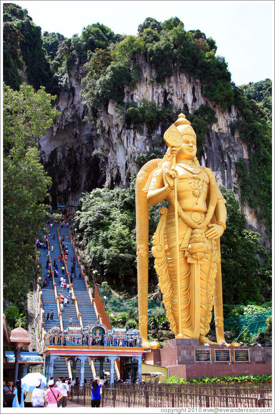 Stairway leading into Batu Caves, with Lord Murugan statue presiding.