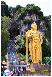 Stairway leading into Batu Caves, with Lord Murugan statue presiding.