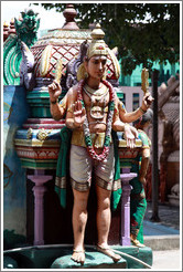 Statue over stairway to Batu Caves.