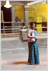 Woman in front of Main Temple, Batu Caves.