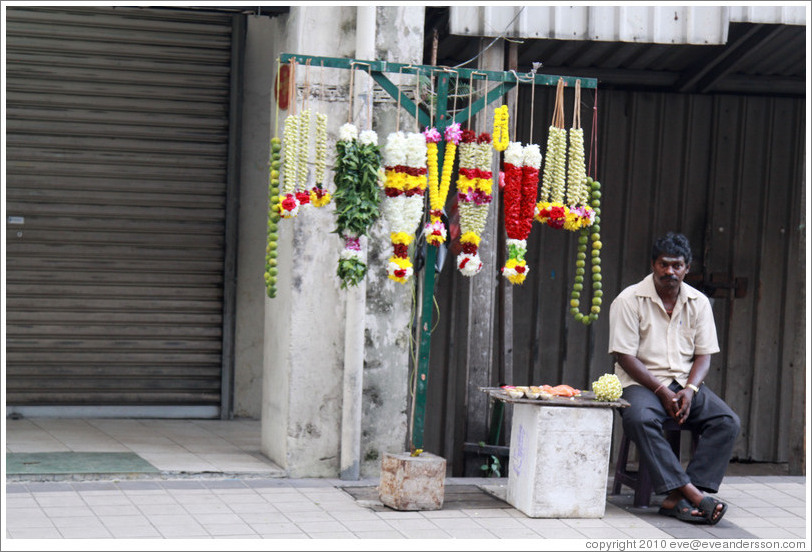 Man selling flower wreaths, Jalan Tun HS Lee.