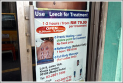 Sign advertising leech treatment, Jalan Tun Perak.