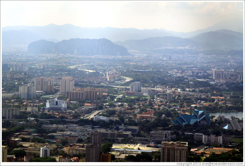 View of Kuala Lumpur from the KL Tower.  The large hill on the left in the background contains the Batu Caves.