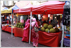 Women at a stall selling jackfruit at the market on Lorong Tuanku Abdul Rahman.