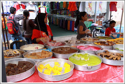 Women selling sweets at the market on Lorong Tuanku Abdul Rahman.