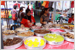 Women selling sweets at the market on Lorong Tuanku Abdul Rahman.