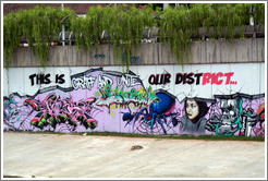 Graffiti at the bank of the Sungai Kelang reading "This is graff and unite our district."