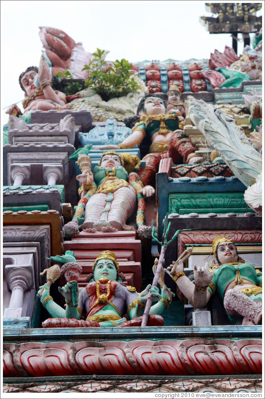 Green woman and other figures, Arulmigu Mahamariamman Temple.