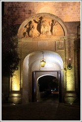 Main gate, from inside Mdina, at night.