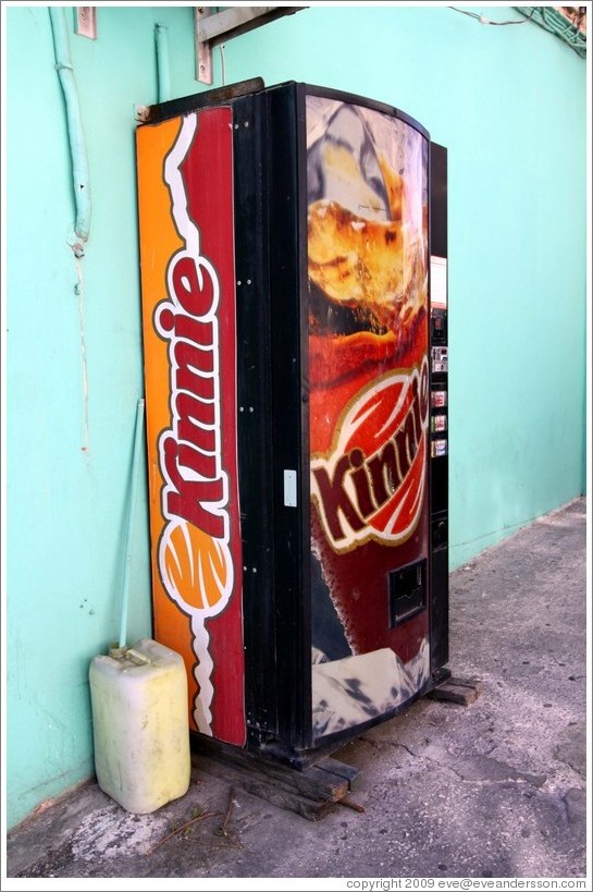 Vending machine selling Kinnie, a citrusy  Maltese soft drink.