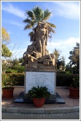 Sculpture of people who appear to be in distress.