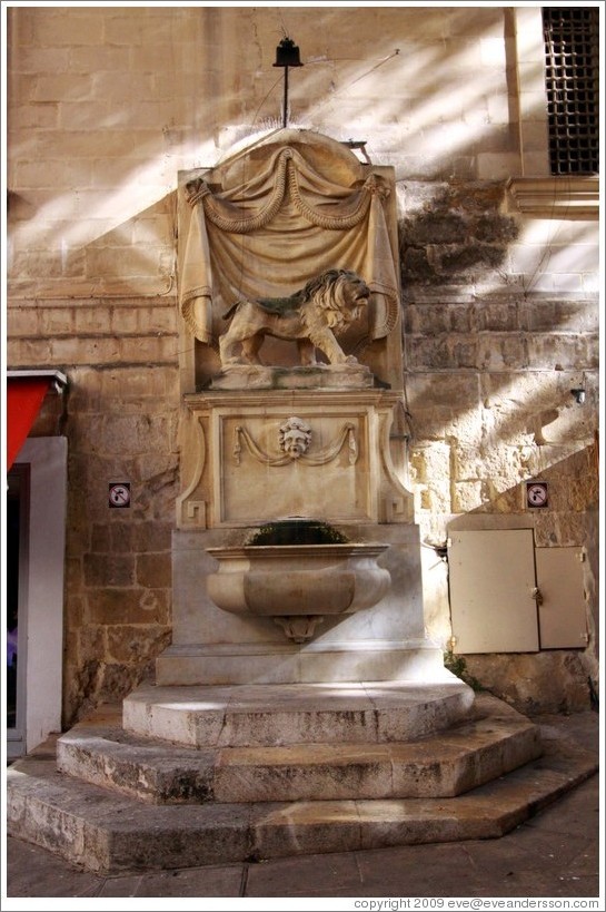 Lion fountain, exterior of St. Johns Co-Cathedral (Kon-Katidral ta' San &#288;wann).