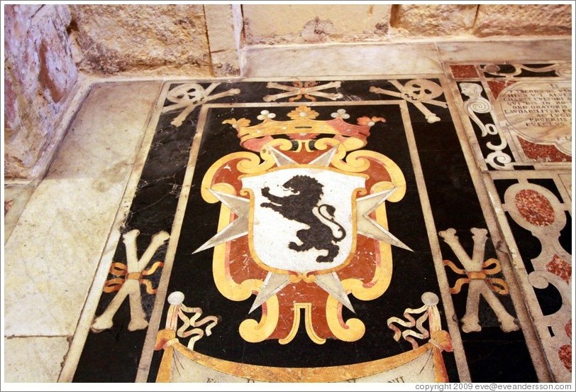 Floor decoration containing a lion and skulls and crossbones, St. Johns Co-Cathedral (Kon-Katidral ta' San &#288;wann).