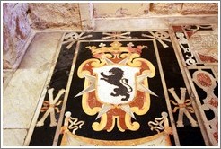 Floor decoration containing a lion and skulls and crossbones, St. Johns Co-Cathedral (Kon-Katidral ta' San &#288;wann).