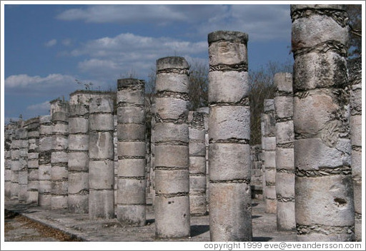 Looking down the rows of columns towards the temple of the warriors. Chichen Itza.