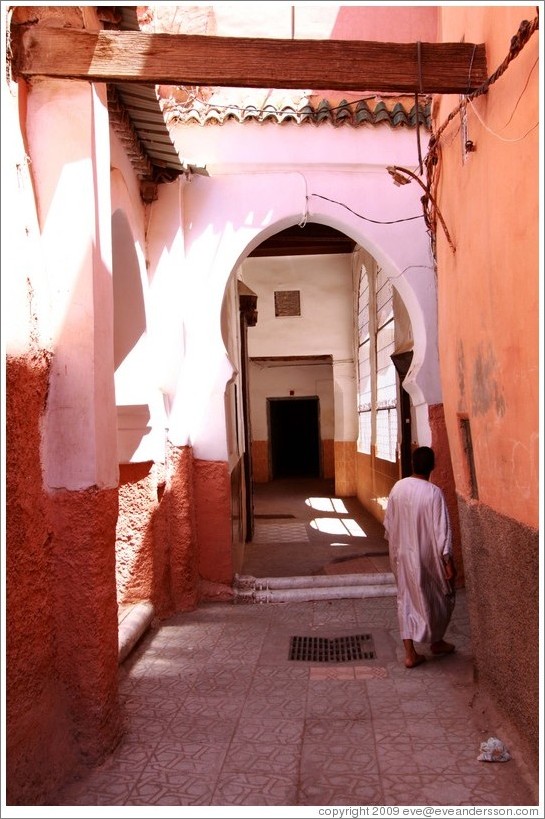 Man and doorway leading to a mosque in the Medina.