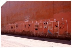 Numbers on a wall in the Medina, perhaps related to elections.