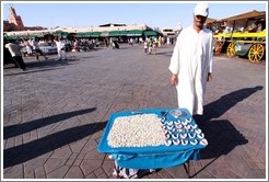 Man with table containing teeth, Jemaa el Fna.