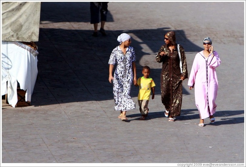 Three women and a child, Jemaa el Fna.