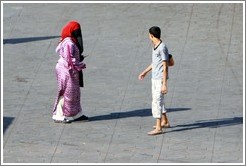 Woman and a boy who had taken her purse, Jemaa el Fna.