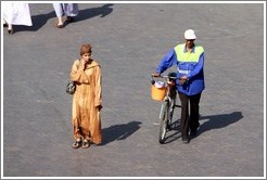 Woman and man with a bike, Jemaa el Fna.