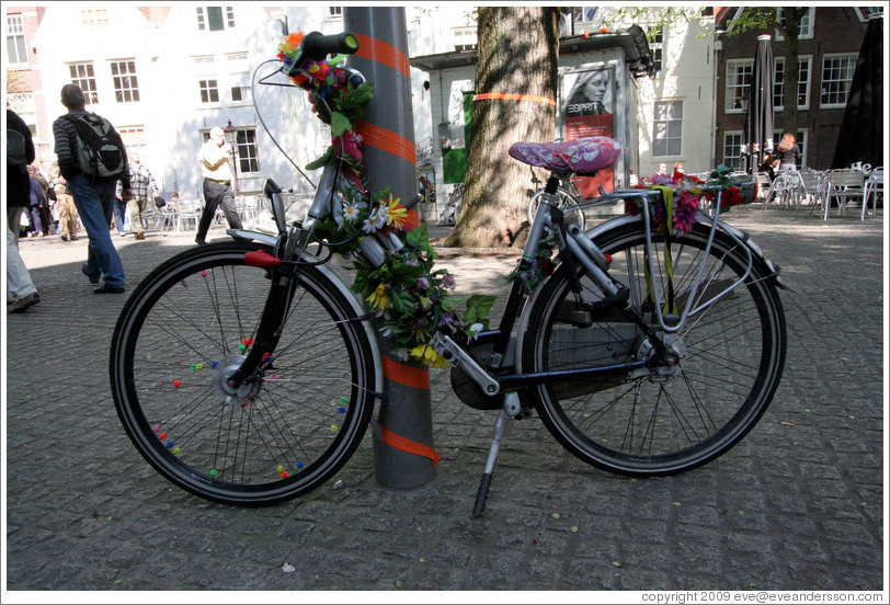 Bicycle decorated with flowers.