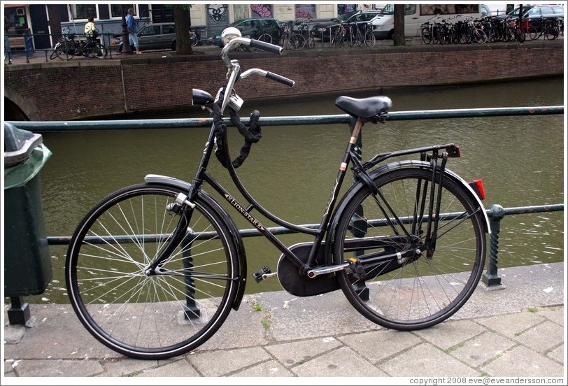 Bicycle on bridge.  Stallstraat, over Kloveniersburgwal, Centrum district.