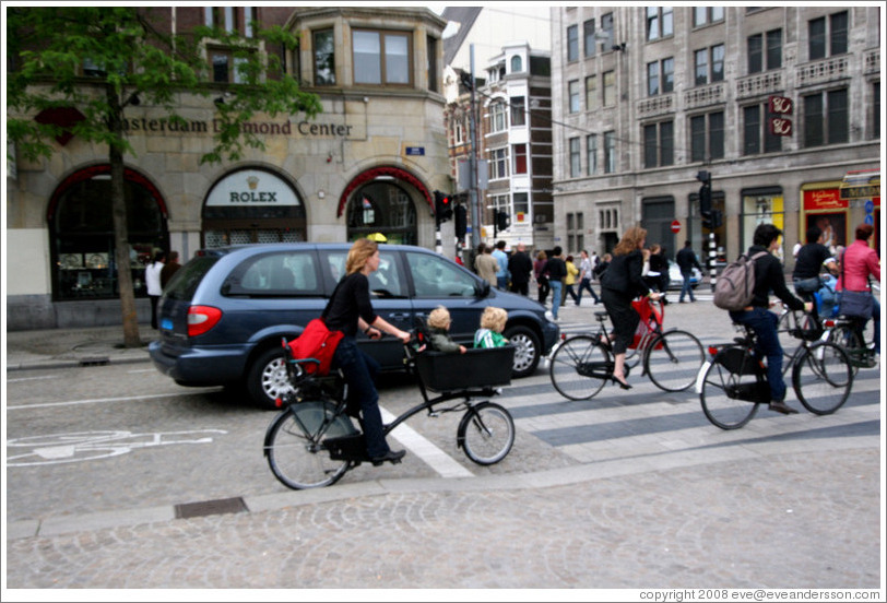 Bicyclists, Dam Square, Centrum district.