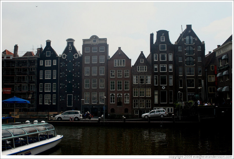 Buildings and canal, Damrak, Centrum district.