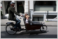 Bicyclist with kids.
