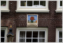 "Dat rosa mel apibus in liefde bloeiende" (something about blooming love). Egelantiersgracht canal, Jordaan district. 