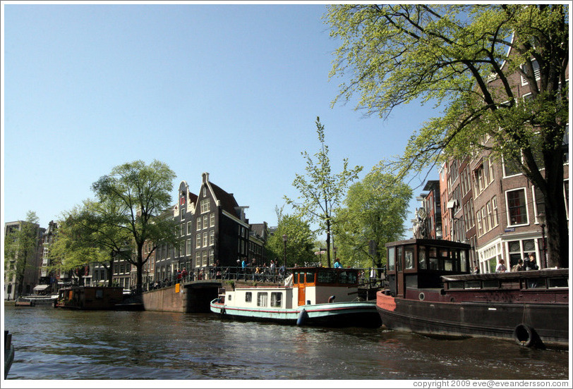 Houseboats and black buildings.  Prinsengracht, Jordaan district.