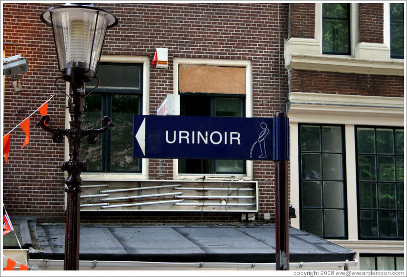 Urinoir (outdoor toilet) sign.  Red Light district.