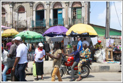 People and umbrellas. Lagos Island.