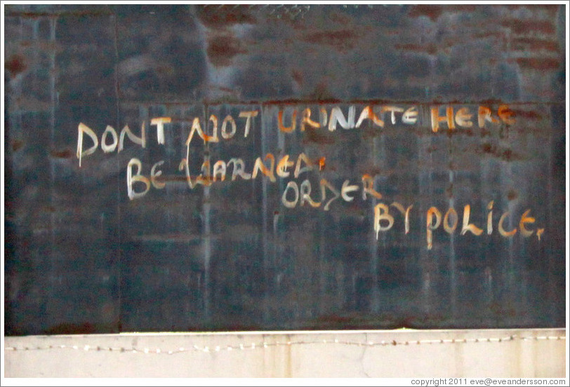 Sign: "Dont Not Urinate Here Be Warned. Order By Police." COD Church Road,  Victoria Island.