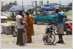 People at the side of the road, Lekki-Epe Expressway, Victoria Island.