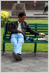 Man on a bench, Plaza de Armas.