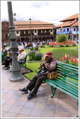 Man on a bench, Plaza de Armas.