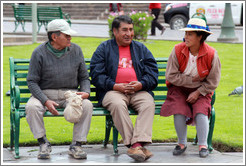 Two men and a woman on a bench, Plaza de Armas.