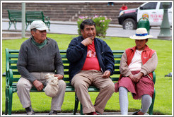 Two men and a woman on a bench, Plaza de Armas.