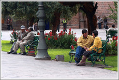 People on benches, Plaza de Armas.