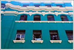 Green building with clothes hanging in the window, Pasaje Jos?laya, Historic Center of Lima.