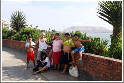 Peruvian family posing, El Malec?Miraflores neighborhood.