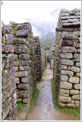 Narrow street between rows of buildings, Machu Picchu.