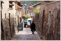 Woman walking down the street.