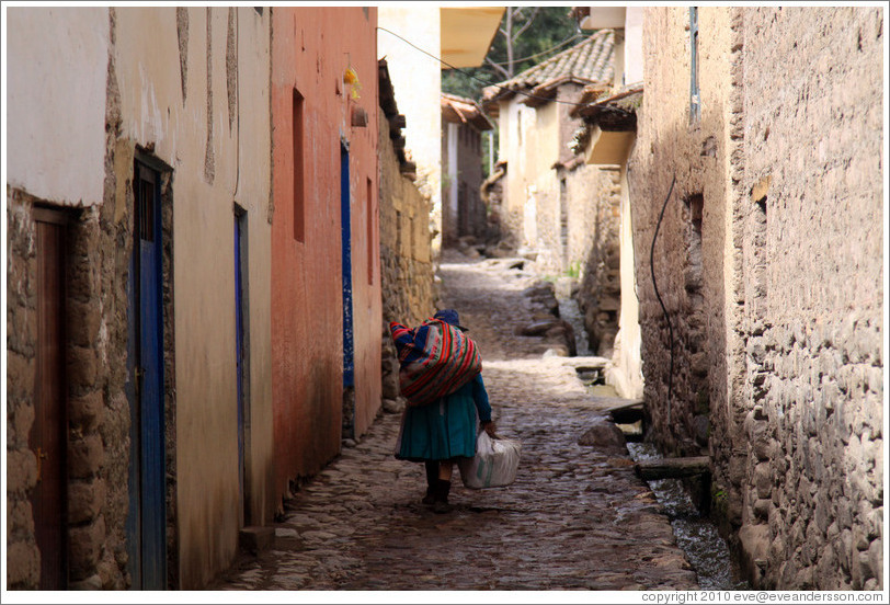 Woman walking down the street.