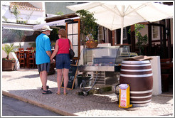 Tourists in front of restaurant, Rua Dr Frederico Ramos Mendes.