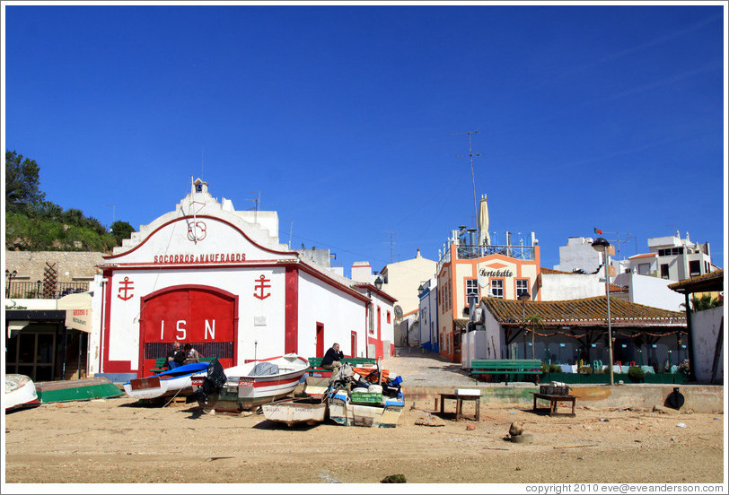 Shore, with fishing boats.