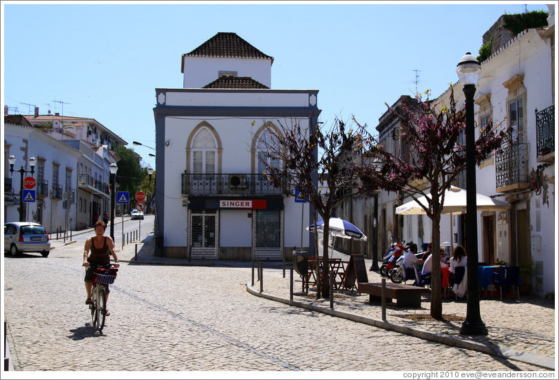 Woman on bicycle, Rua da Liberdade.