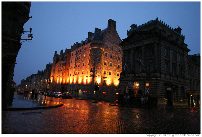 Bank Hotel and SAS Radisson Hotel, lit up in the pre-dawn, with light snow falling.  High Street.  Old Town.